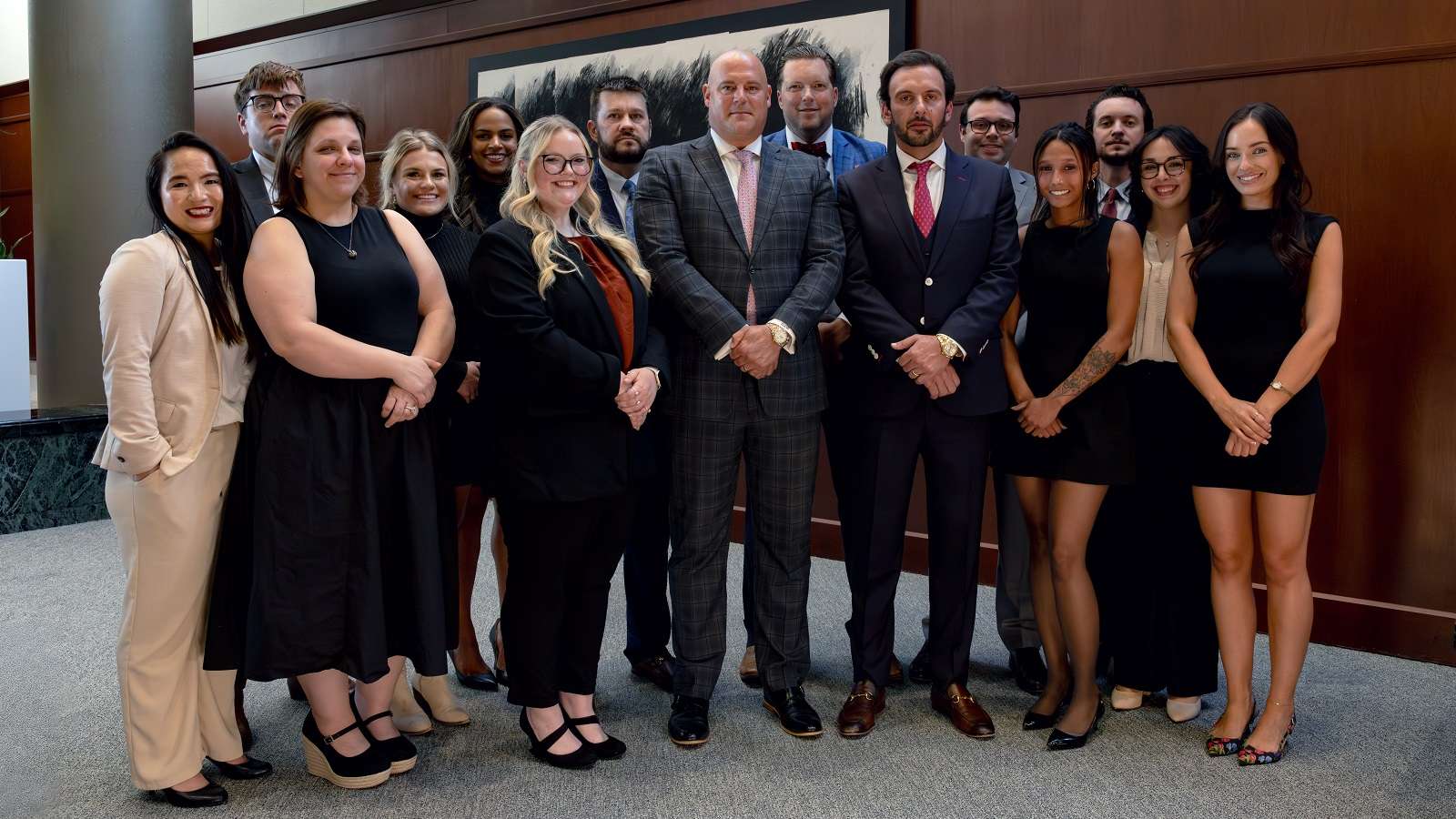 A photograph of the entire staff of Combs Waterkotte's Chicago Criminal Defense Lawyers Team